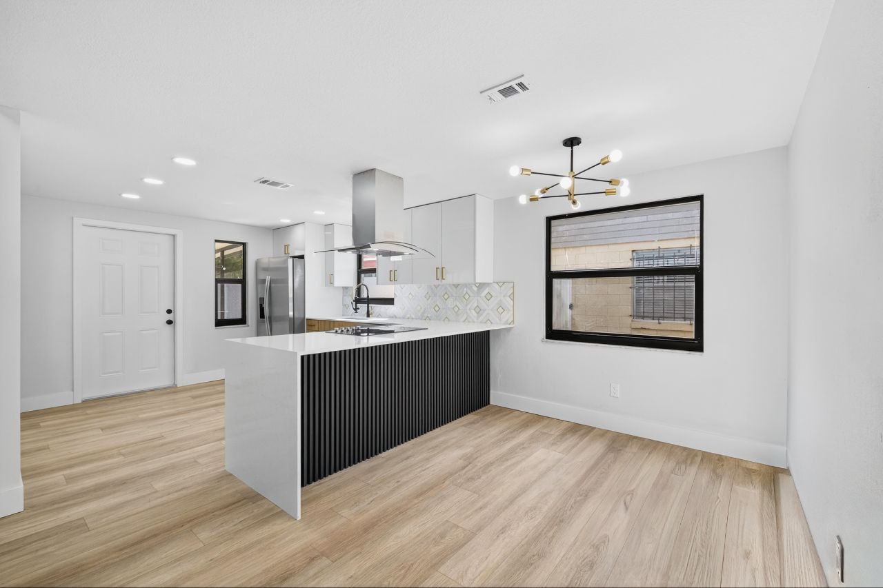 Modern kitchen with elegant door and window